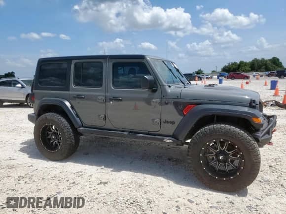 2021 Jeep Wrangler Unlimited 80th Anniversary с VIN 1C4HJXDG2MW846360, выставлен на аукционе Copart как лот 62721735 с пробегом 17 099 миль миль и Списание • Salvage title. История ставок и продаж доступна на DreamBid. Изображение 4.