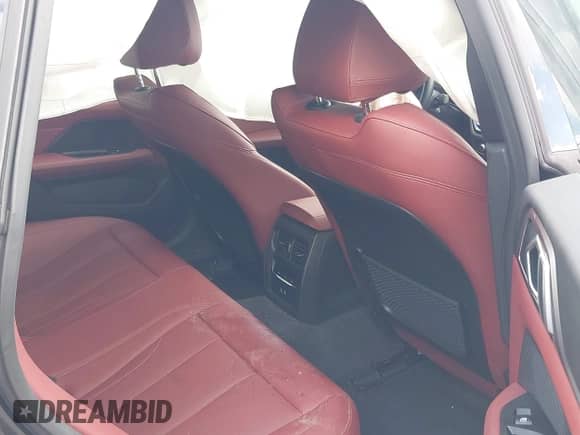 2024 BMW i4 xDrive40 with VIN WBY83FB03RFT31075, listed as a IAAI auction lot 42743691 with 14,883 mi miles and . Bid and sale history available at DreamBid. Image 8.