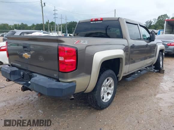 2014 Chevrolet Silverado 1500 LT z VIN 3GCUKREC3EG365715, wystawiony jako IAAI lot #43303491 z przebiegiem 204 802 mil mil oraz . Historia ofert i sprzedaży dostępna na DreamBid. Obrazek 4.