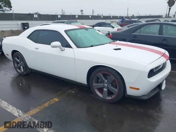 2013 Dodge Challenger SXT with VIN 2C3CDYAG7DH736726, listed as a IAAI auction lot 41530042 with 129,259 mi miles and . Bid and sale history available at DreamBid. Image 1.