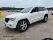 2012 Jeep Grand Cherokee Overland z VIN 1C4RJFCG8CC325367, wystawiony jako Copart lot #66274415 z przebiegiem 149 290 mil mil oraz Szkoda całkowita • Salvage title. Historia ofert i sprzedaży dostępna na DreamBid. Obrazek 1.
