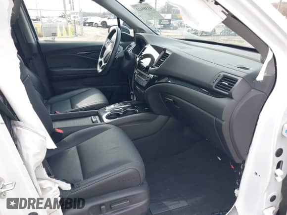 2022 Honda Pilot Touring 8-Passenger with VIN 5FNYF5H99NB001383, listed as a IAAI auction lot 41389422 with 56,055 mi miles and . Bid and sale history available at DreamBid. Image 5.