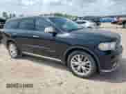 2014 Dodge Durango Citadel with VIN 1C4RDHEG5EC394276, listed as a Copart auction lot 69506095 with 212,027 mi miles and Clean title. Bid and sale history available at DreamBid. Image 4.