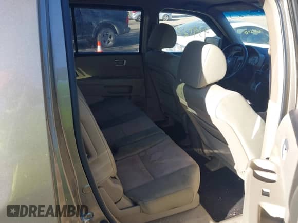 2009 Honda Pilot EX with VIN 5FNYF48479B052563, listed as a IAAI auction lot 43432723 with 218,691 mi miles and . Bid and sale history available at DreamBid. Image 8.