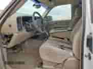 2004 Chevrolet Silverado 1500 Work Truck with VIN 2GCEC19V641173274, listed as a Copart auction lot 70104735 with 184,952 mi miles and Salvage title. Bid and sale history available at DreamBid. Image 7.