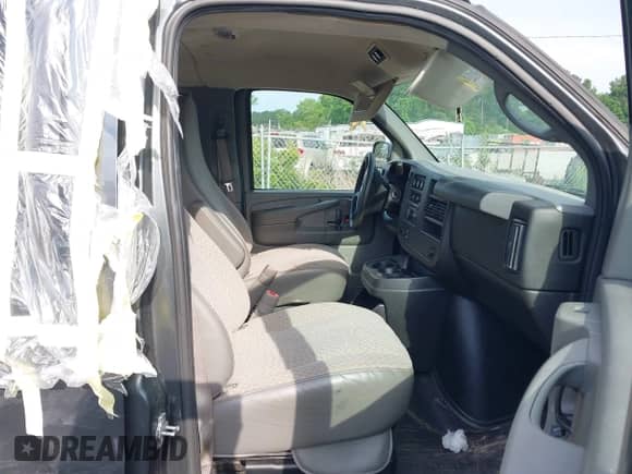 2014 Chevrolet Express Passenger LS with VIN 1GAWGPFG6E1173373, listed as a IAAI auction lot 42275513 with 26,642 mi miles and . Bid and sale history available at DreamBid. Image 5.