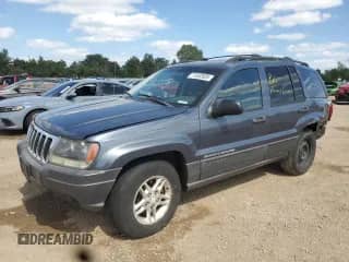 2003 Jeep Grand Cherokee Laredo with VIN 1J4GW48S23C539842, listed as a Copart auction lot 71552925 with Not provided miles and Salvage title. Bid and sale history available at DreamBid. Image 1.