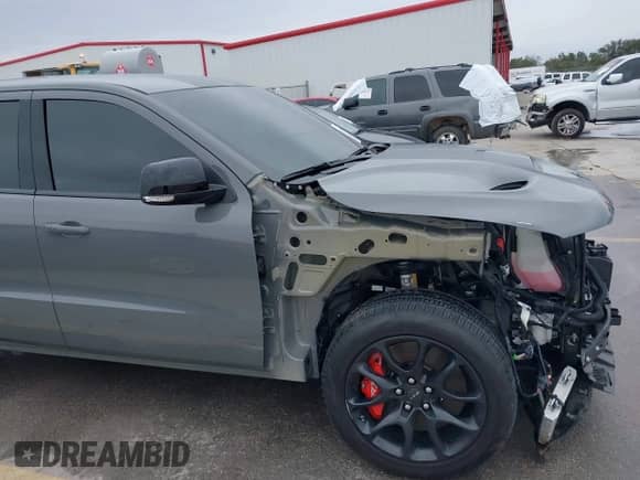 2021 Dodge Durango SRT Hellcat with VIN 1C4SDJH92MC605759, listed as a IAAI auction lot 41639174 with 4,800 mi miles and . Bid and sale history available at DreamBid. Image 18.