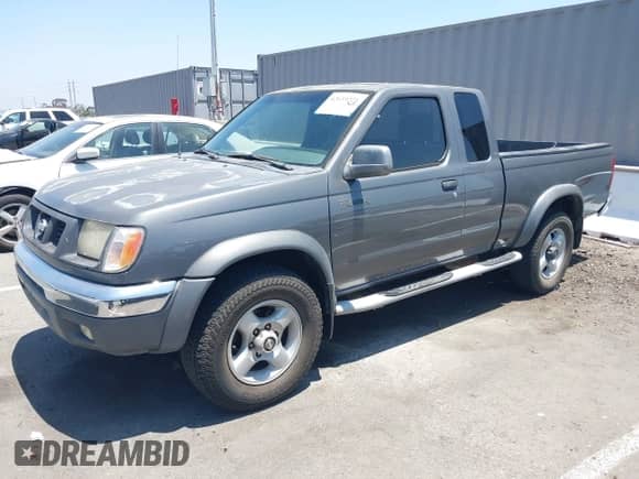 2000 Nissan Frontier XE with VIN 1N6ED26T0YC320918, listed as a IAAI auction lot 42659221 with 308,056 mi miles and . Bid and sale history available at DreamBid. Image 2.