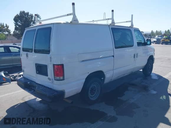2013 Ford Econoline Cargo Commercial with VIN 1FTNE1EW7DDA98789, listed as a IAAI auction lot 42382594 with 251,602 mi miles and . Bid and sale history available at DreamBid. Image 4.