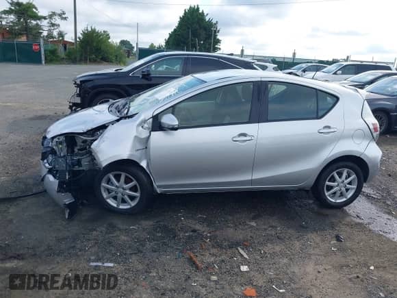 2014 Toyota Prius One with VIN JTDKDTB30E1075790, listed as a IAAI auction lot 42592812 with 100,821 mi miles and . Bid and sale history available at DreamBid. Image 15.