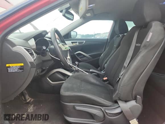 2013 Hyundai Veloster w/Black Int с VIN KMHTC6AD5DU173242, выставлен на аукционе Copart как лот 64368995 с пробегом 157 766 миль миль и Чистый • Clean title. История ставок и продаж доступна на DreamBid. Изображение 7.