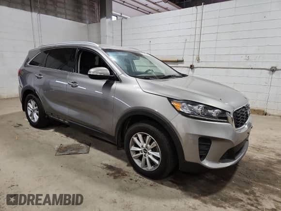 2019 Kia Sorento L z VIN 5XYPG4A3XKG525347, wystawiony jako Copart lot #84659405 z przebiegiem 99 005 mil mil oraz Szkoda całkowita • Salvage title. Historia ofert i sprzedaży dostępna na DreamBid. Obrazek 4.