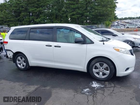 2012 Toyota Sienna with VIN 5TDZK3DC2CS219311, listed as a IAAI auction lot 43106345 with 158,446 mi miles and . Bid and sale history available at DreamBid. Image 14.