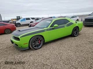 2023 Dodge Challenger R/T с VIN 2C3CDZBT7PH645056, выставлен на аукционе Copart как лот 86183515 с пробегом 2 954 миль миль и Списание • Salvage title. История ставок и продаж доступна на DreamBid. Изображение 1.