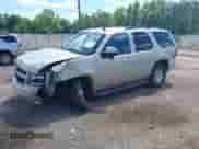 2014 Chevrolet Tahoe LS with VIN 1GNSCAE08ER128141, listed as a IAAI auction lot 42177785 with 108,548 mi miles and . Bid and sale history available at DreamBid. Image 2.