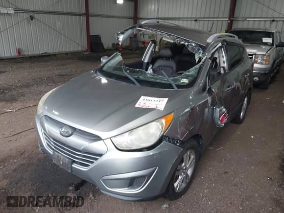 2012 Hyundai Tucson GLS with VIN KM8JU3AC7CU388341, listed as a IAAI auction lot 43014447 with 35,375 mi miles and . Bid and sale history available at DreamBid. Image 6.