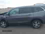 2018 Honda Pilot EX with VIN 5FNYF6H33JB044757, listed as a IAAI auction lot 43262855 with 106,702 mi miles and . Bid and sale history available at DreamBid. Image 14.