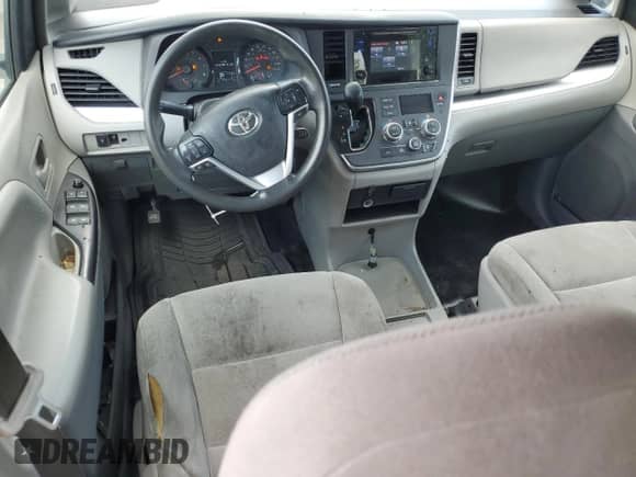 2016 Toyota Sienna L with VIN 5TDZK3DC5GS717234, listed as a Copart auction lot 61906885 with 308,811 mi miles and Salvage title. Bid and sale history available at DreamBid. Image 8.