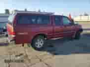 2002 Toyota Tundra Limited z VIN 5TBBT481X2S303350, wystawiony jako Copart lot #87486485 z przebiegiem 184 442 mil mil oraz Szkoda całkowita • Salvage title. Historia ofert i sprzedaży dostępna na DreamBid. Obrazek 3.