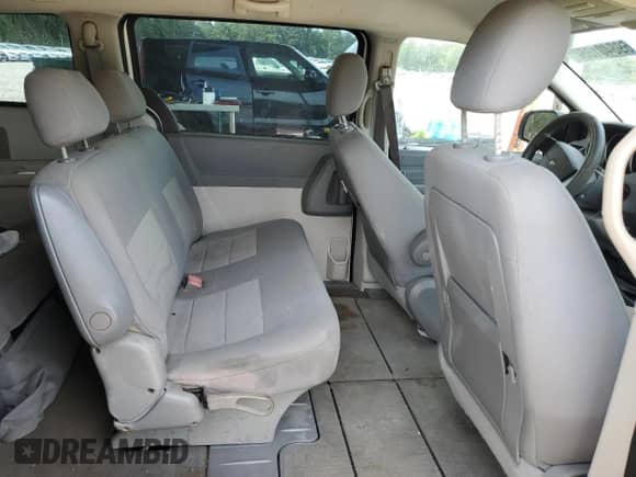 2008 Dodge Grand Caravan SE z VIN 1D8HN44H18B107958, wystawiony jako Copart lot #69840105 z przebiegiem 175 088 mil mil oraz Szkoda całkowita • Salvage title. Historia ofert i sprzedaży dostępna na DreamBid. Obrazek 10.
