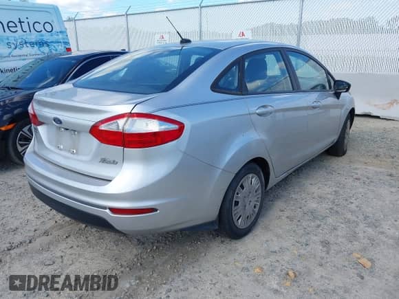 2018 Ford Fiesta S with VIN 3FADP4AJ8JM124176, listed as a IAAI auction lot 43391553 with 89,506 mi miles and . Bid and sale history available at DreamBid. Image 4.