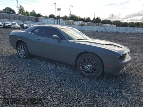 2018 Dodge Challenger GT with VIN 2C3CDZGG4JH205637, listed as a Copart auction lot 68588345 with 125,422 mi miles and Salvage title. Bid and sale history available at DreamBid. Image 4.