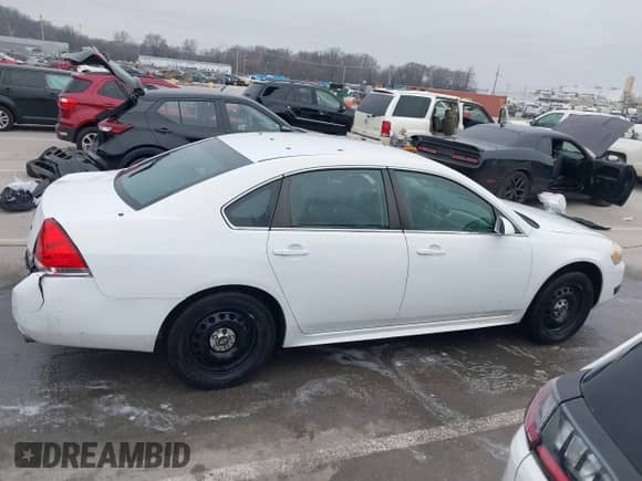 2013 Chevrolet Impala Police with VIN 2G1WD5E35D1222227, listed as a IAAI auction lot 41163786 with 176,742 mi miles and . Bid and sale history available at DreamBid. Image 13.