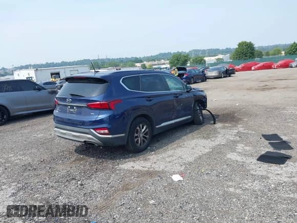 2019 Hyundai Santa Fe SE with VIN 5NMS2CAD5KH089783, listed as a IAAI auction lot 42858424 with 78,906 mi miles and . Bid and sale history available at DreamBid. Image 4.
