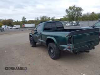 1999 Dodge Dakota z VIN 1B7GG26Y0XS261615, wystawiony jako IAAI lot #43436216 z przebiegiem 126 384 mil mil oraz . Historia ofert i sprzedaży dostępna na DreamBid. Obrazek 3.