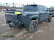 2024 Toyota Tacoma SR5 with VIN 3TYLB5JN1RT039046, listed as a IAAI auction lot 41610499 with 6,455 mi miles and . Bid and sale history available at DreamBid. Image 4.