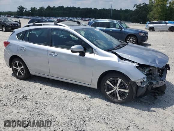 2023 Subaru Impreza Premium with VIN 4S3GTAD61P3705005, listed as a Copart auction lot 66817245 with 27,443 mi miles and Salvage title. Bid and sale history available at DreamBid. Image 4.