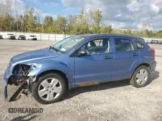 2007 Dodge Caliber SXT with VIN 1B3HB48B57D218885, listed as a Copart auction lot 83769795 with 104,586 mi miles and Salvage title. Bid and sale history available at DreamBid. Image 1.