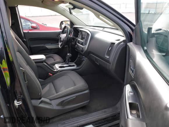 2018 Chevrolet Colorado 2WD LT z VIN 1GCHSCEA4J1266892, wystawiony jako IAAI lot #41776488 z przebiegiem 151 321 mil mil oraz . Historia ofert i sprzedaży dostępna na DreamBid. Obrazek 5.