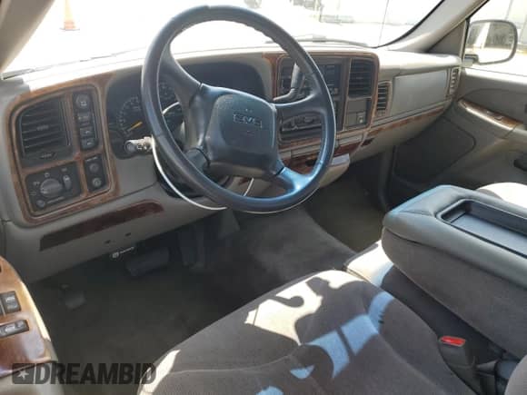 1999 GMC Sierra 1500 SLE z VIN 1GTEK14T2XZ518627, wystawiony jako Copart lot #64205735 z przebiegiem 194 004 mil mil oraz Nie do naprawy • Non repairable. Historia ofert i sprzedaży dostępna na DreamBid. Obrazek 8.