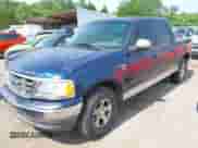 2002 Ford F-150 XLT z VIN 1FTRW07612KA74888, wystawiony jako IAAI lot #42465713 z przebiegiem Nie podano mil oraz . Historia ofert i sprzedaży dostępna na DreamBid. Obrazek 2.