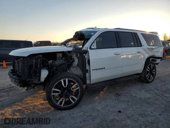 2020 Chevrolet Suburban LT z VIN 1GNSCHKC2LR220477, wystawiony jako Copart lot #71464335 z przebiegiem Nie podano mil oraz Szkoda całkowita • Salvage title. Historia ofert i sprzedaży dostępna na DreamBid. Obrazek 1.