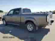 2006 Toyota Tundra Limited z VIN 5TBET38106S513582, wystawiony jako Copart lot #69153895 z przebiegiem 141 292 mil mil oraz Szkoda całkowita • Salvage title. Historia ofert i sprzedaży dostępna na DreamBid. Obrazek 2.