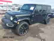 2023 Jeep Wrangler Sahara with VIN 1C4JJXP62PW628735, listed as a IAAI auction lot 42683940 with 46,534 mi miles and . Bid and sale history available at DreamBid. Image 2.