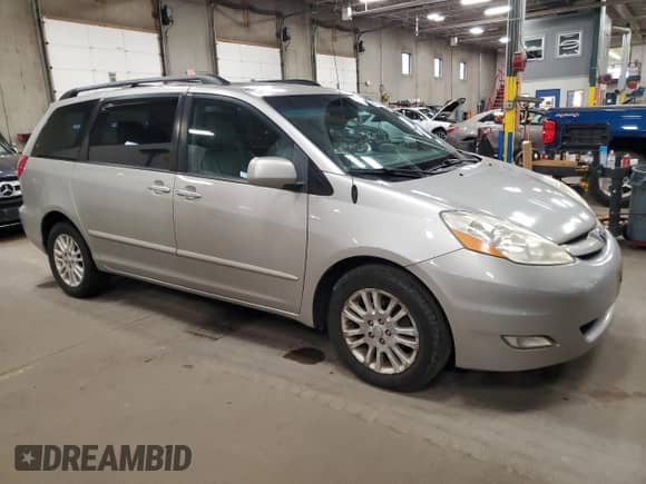 2010 Toyota Sienna XLE с VIN 5TDYK4CC1AS311946, выставлен на аукционе Copart как лот 86078525 с пробегом 193 862 миль миль и Списание • Salvage title. История ставок и продаж доступна на DreamBid. Изображение 4.