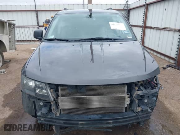 2018 Dodge Journey SE with VIN 3C4PDCAB7JT445179, listed as a IAAI auction lot 43363807 with 127,451 mi miles and . Bid and sale history available at DreamBid. Image 13.