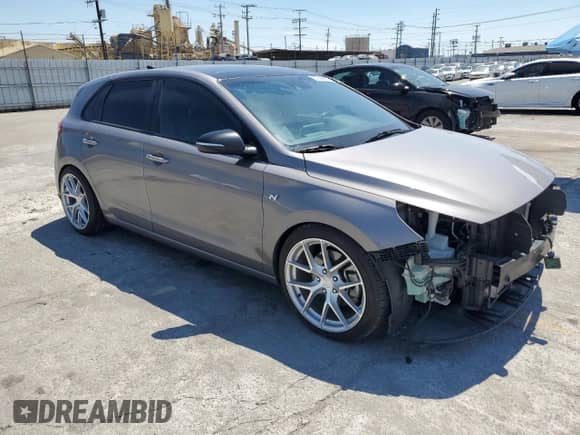 2020 Hyundai Elantra N Line z VIN KMHH55LC0LU134068, wystawiony jako Copart lot #67844965 z przebiegiem 133 634 mil mil oraz Szkoda całkowita • Salvage title. Historia ofert i sprzedaży dostępna na DreamBid. Obrazek 4.