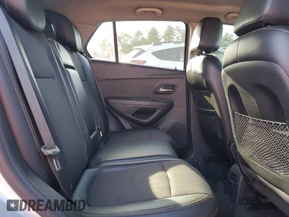 2018 Chevrolet Trax LT z VIN KL7CJLSB4JB632688, wystawiony jako Copart lot #84636335 z przebiegiem 125 350 mil mil oraz Szkoda całkowita • Salvage title. Historia ofert i sprzedaży dostępna na DreamBid. Obrazek 11.