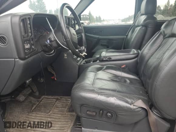 2002 GMC Sierra 1500 SLE with VIN 2GTEK19T621349271, listed as a Copart auction lot 81713245 with 128,287 mi miles and Salvage title. Bid and sale history available at DreamBid. Image 7.