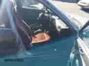 1991 Honda Accord EX z VIN JHMCB756XMC801180, wystawiony jako IAAI lot #43504248 z przebiegiem 268 067 mil mil oraz . Historia ofert i sprzedaży dostępna na DreamBid. Obrazek 5.