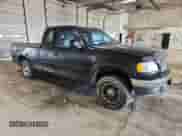1999 Ford F-150 z VIN 1FTRX18W3XNA86693, wystawiony jako Copart lot #82242115 z przebiegiem 157 384 mil mil oraz Nie do naprawy • Non repairable. Historia ofert i sprzedaży dostępna na DreamBid. Obrazek 4.