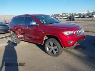 2015 Jeep Grand Cherokee Overland with VIN 1C4RJFCG6FC613232, listed as a IAAI auction lot 43476794 with 106,697 mi miles and . Bid and sale history available at DreamBid. Image 1.