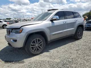 2018 Jeep Grand Cherokee Sterling with VIN 1C4RJEBGXJC159281, listed as a Copart auction lot 61372155 with 132,693 mi miles and Salvage title. Bid and sale history available at DreamBid. Image 1.