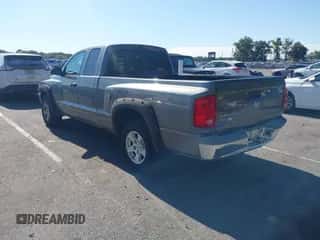 2006 Dodge Dakota SLT with VIN 1D7HE42KX6S560010, listed as a IAAI auction lot 43198380 with 135,471 mi miles and . Bid and sale history available at DreamBid. Image 3.