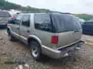 2002 Chevrolet Blazer LS with VIN 1GNCS13W12K140165, listed as a IAAI auction lot 42912485 with 247,677 mi miles and . Bid and sale history available at DreamBid. Image 3.